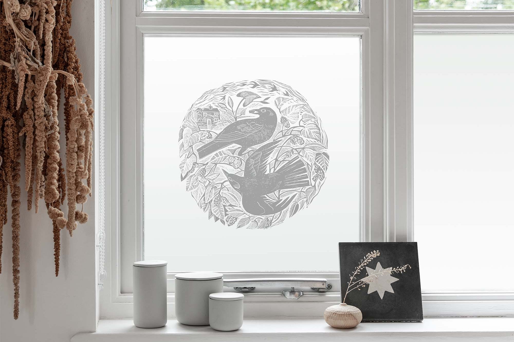 Decorative window film with blackbirds by Angela Harding 