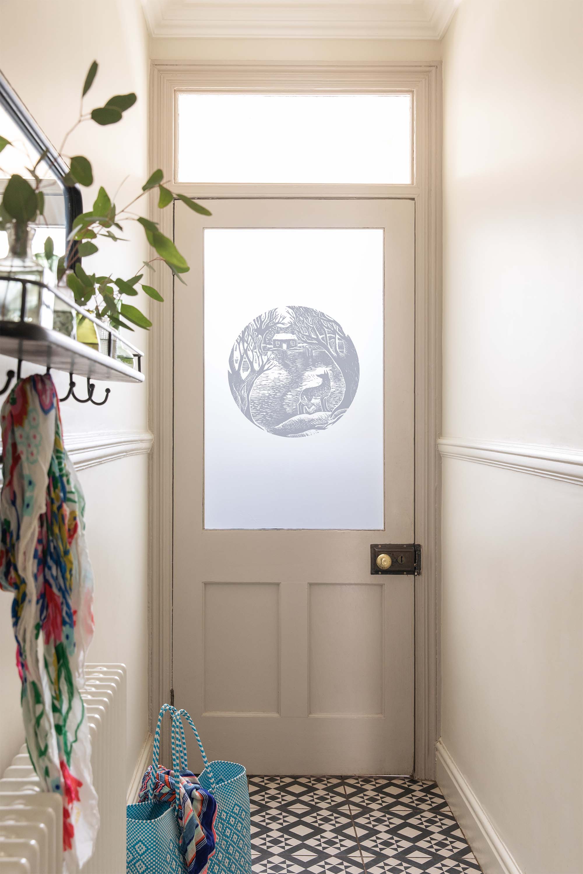 Decorative glass window film with fox in spotlight